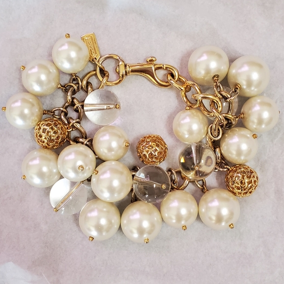 Coach statement bracelet w/pearls and golden charms
